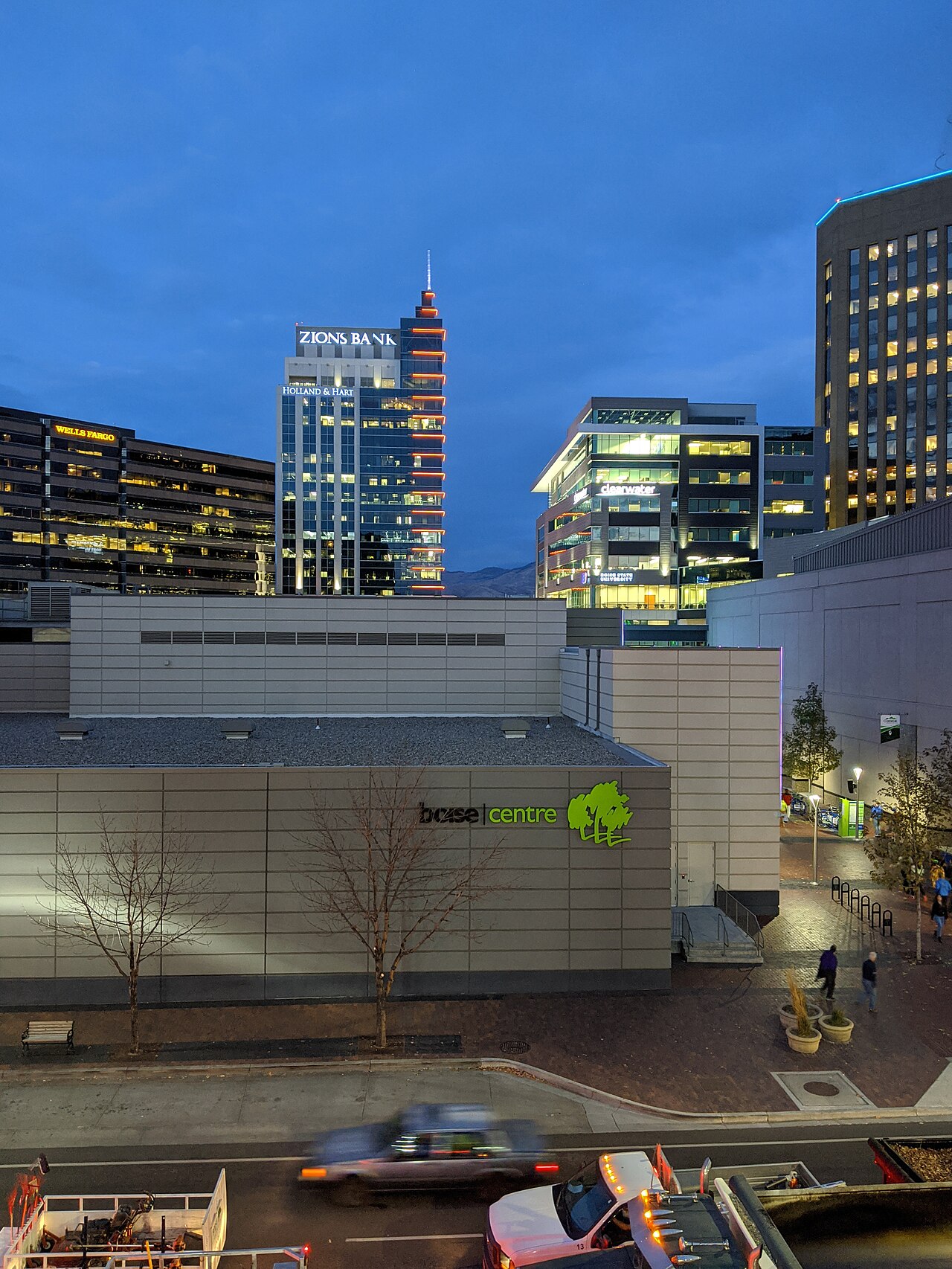 View of downtown Boise at night, with the Boise Centre in the foreground, and the Wells Fargo Center, 8th and Main, Clearwater Building, and US Bank Building in the background