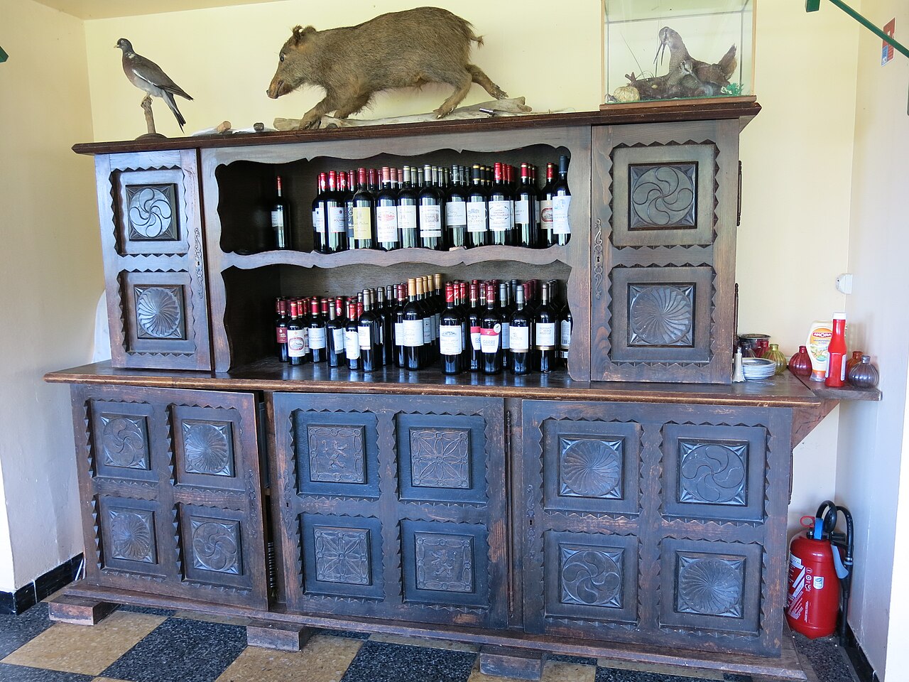 Basque cupboard with lauburu (=basque cross) in the rooom of the restaurant du col d'Osquich (Pyrénées-Atlantiques, France).