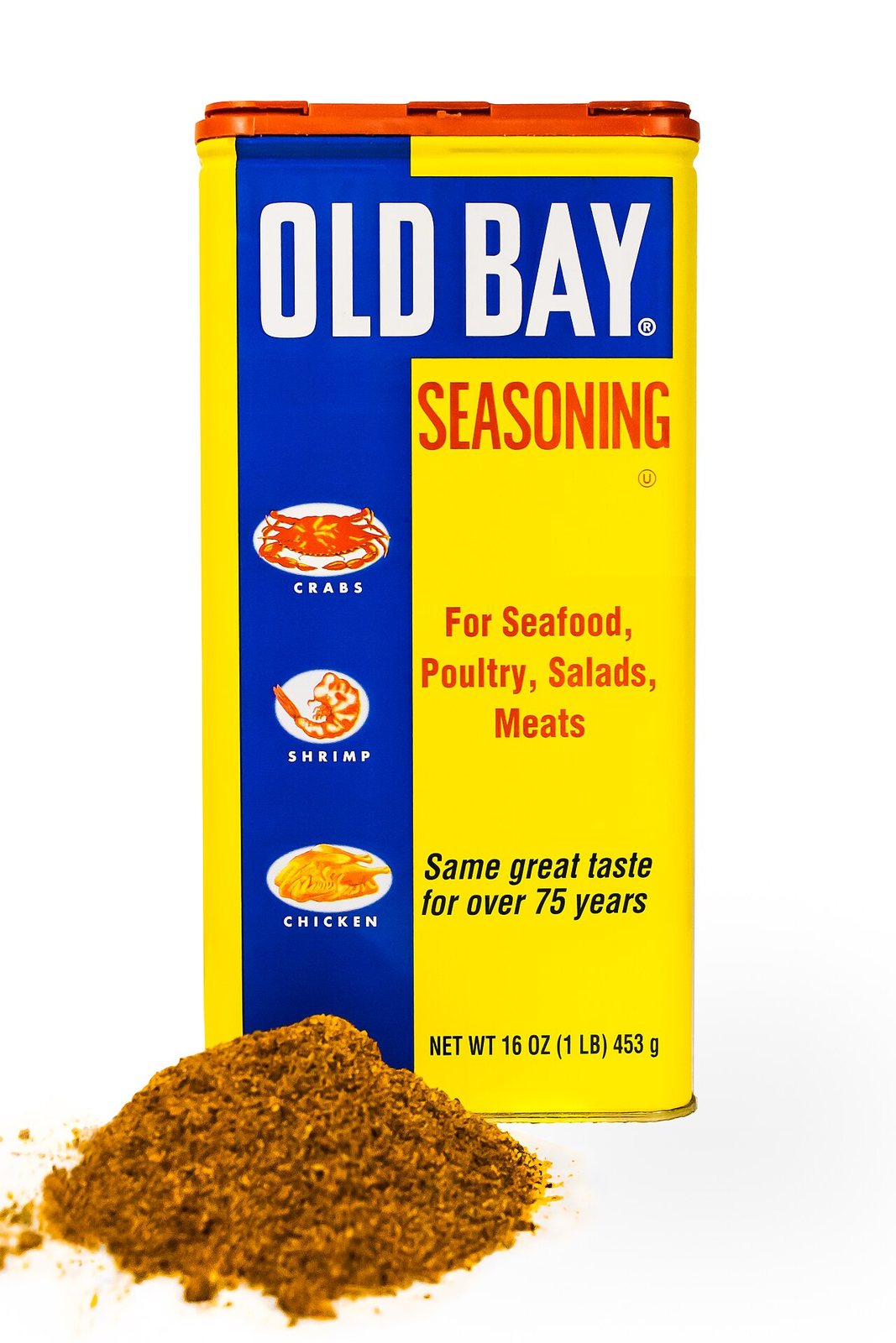 Cropped version of "Old Bay". 16 oz. can of Old Bay spice with a small heap of its contents in the foreground.