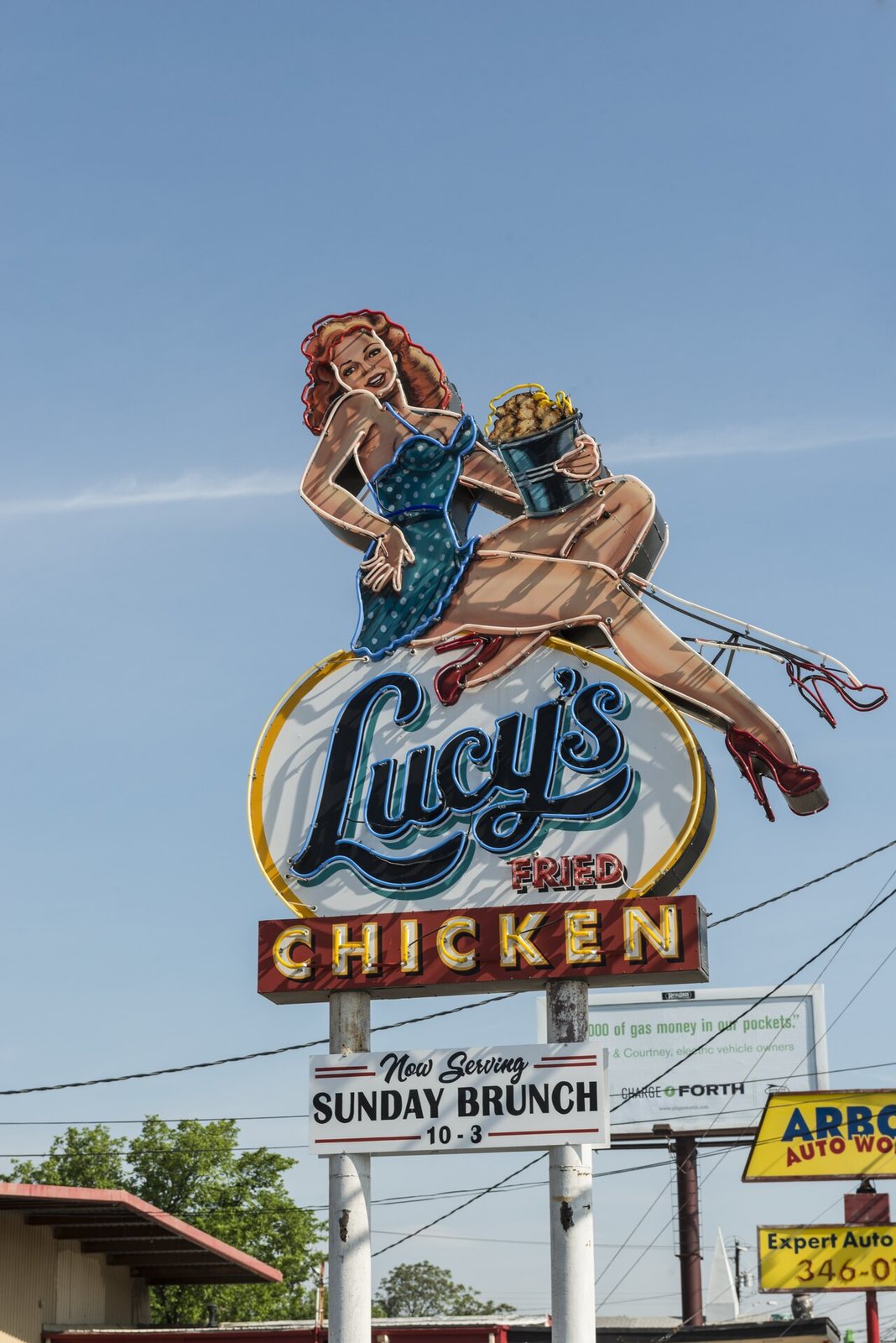 Title: Provocative neon sign at a Lucy's Fried Chicken location on Burnet Road in Austin, Texas
Physical description: 1 photograph : digital, tiff file, color.

Notes: Title, date, and keywords based 