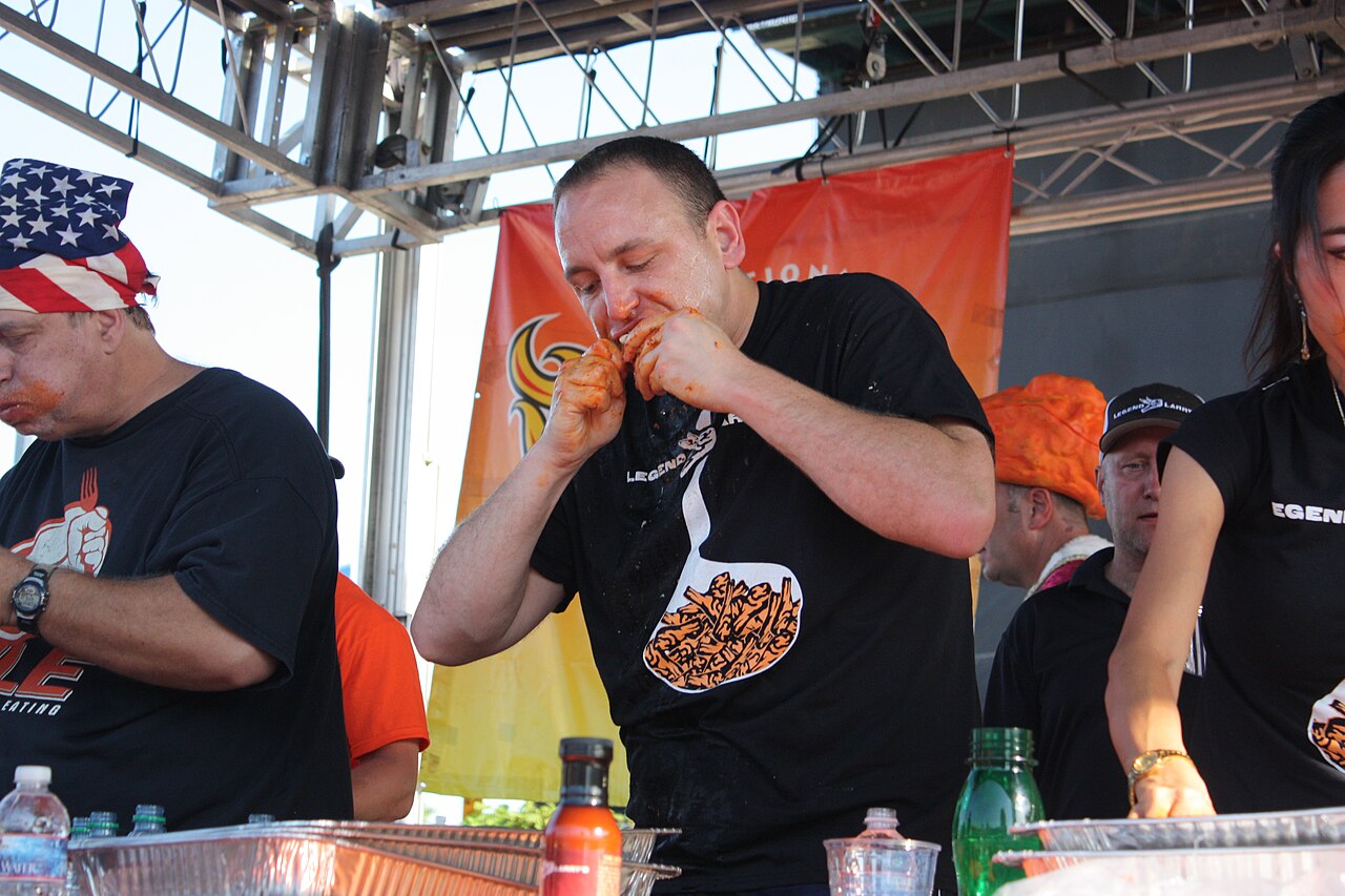 Joey Chestnut competing at the 2012 National Buffalo Wing Festival at Sahlen Field in Buffalo, NY