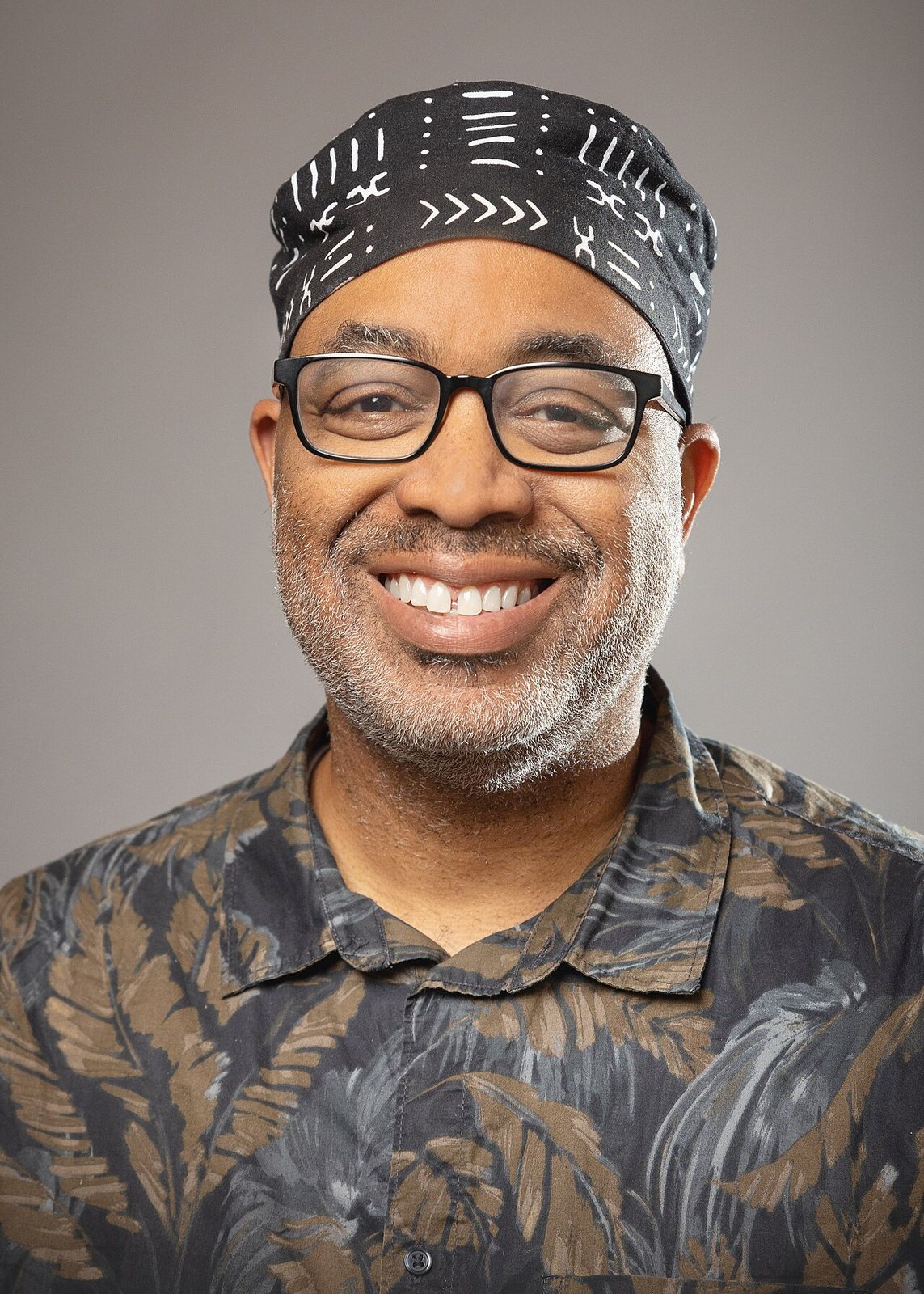 Headshot of Adrian Miller, award-winning author and professional speaker