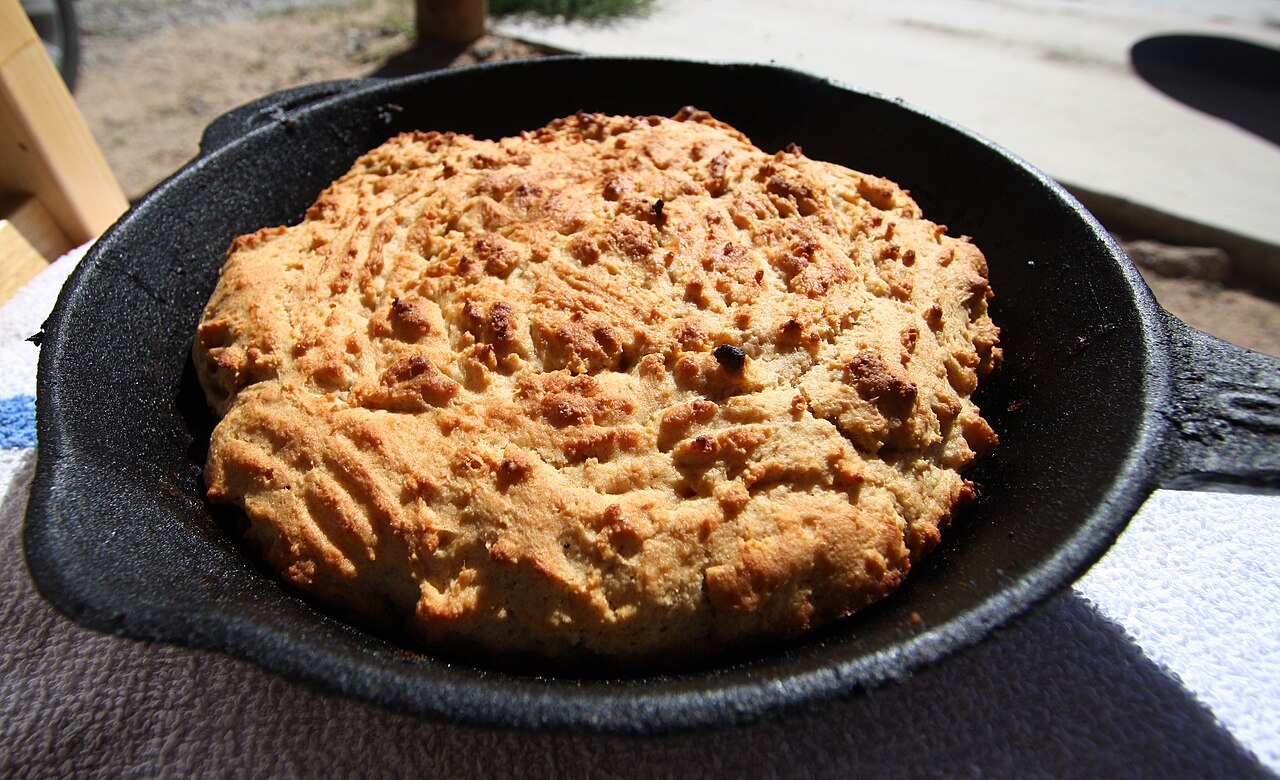 Corn bread baked in a cast iron skillet.
