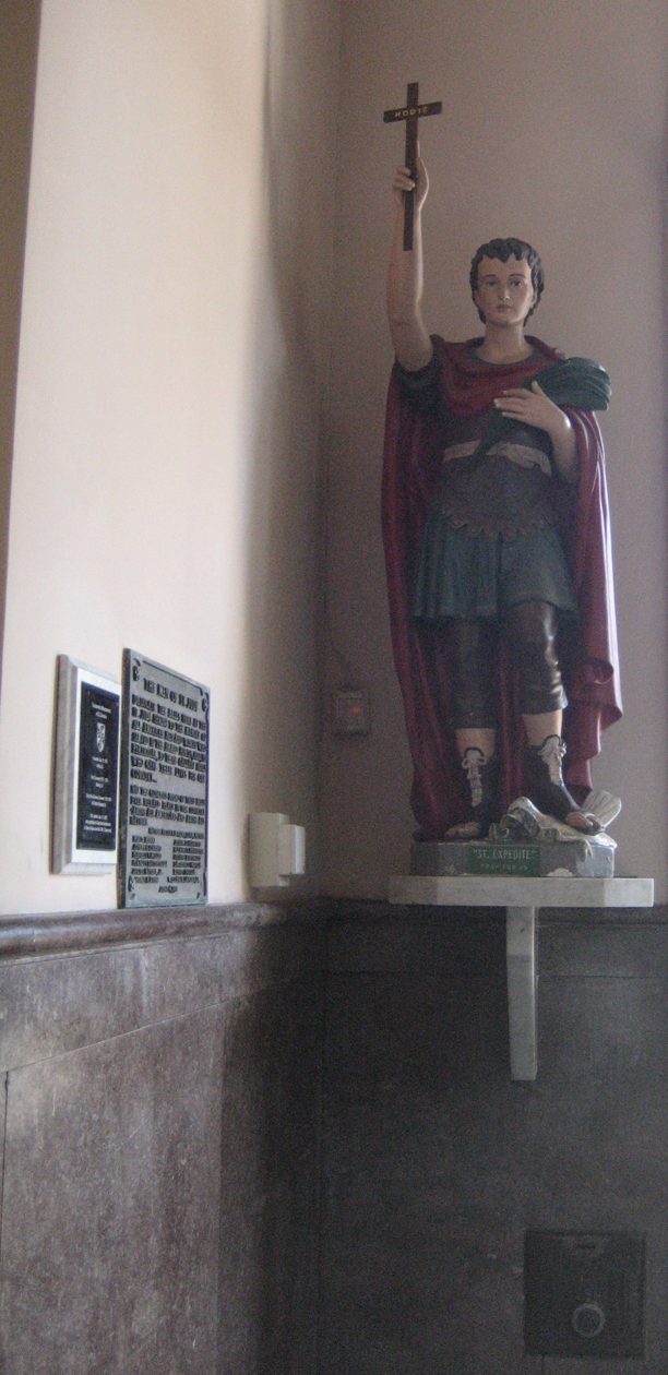 Statue of Saint Expedite on a wall bracket beside the entrance of Our Lady of Guadalupe Chapel, New Orleans.