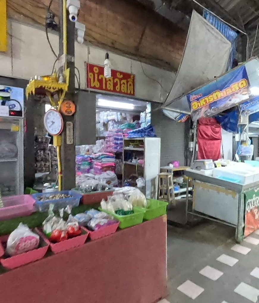 Fresh vegetables and a scale in Chiang Rai Municipal Market 1