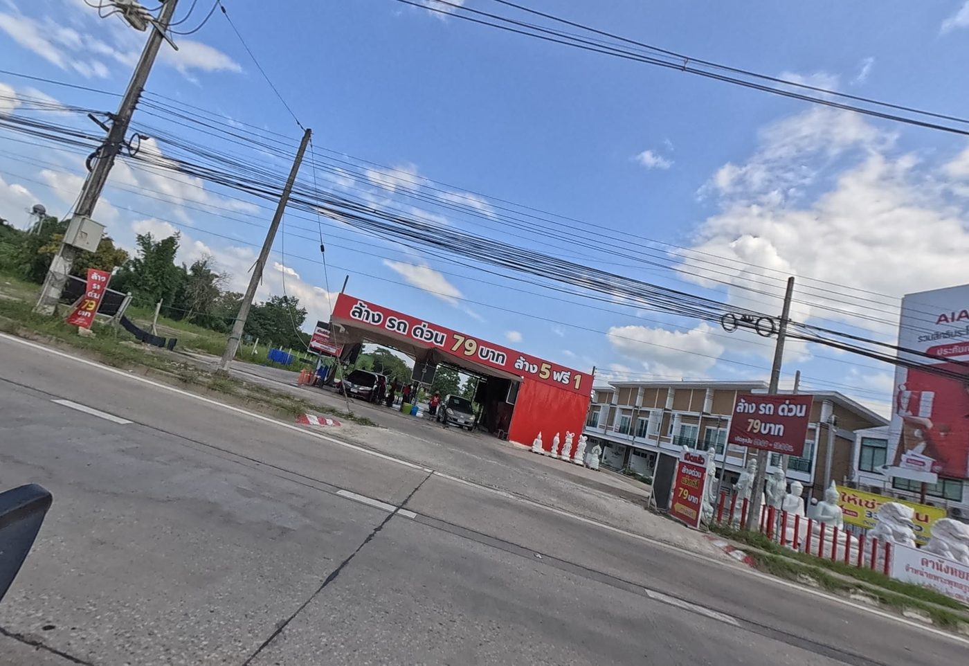 Tyre shop with a red front on the highway
