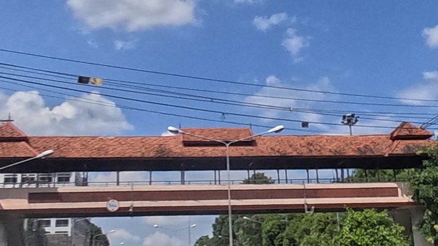 Orange tiled-roof skywalk over the road