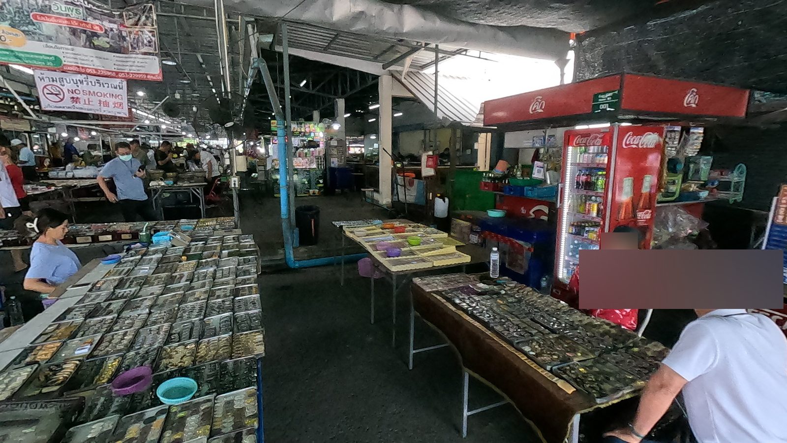 The long aisle of amulet trays