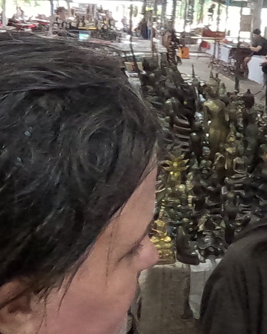 Bronze Buddha images on a stall
