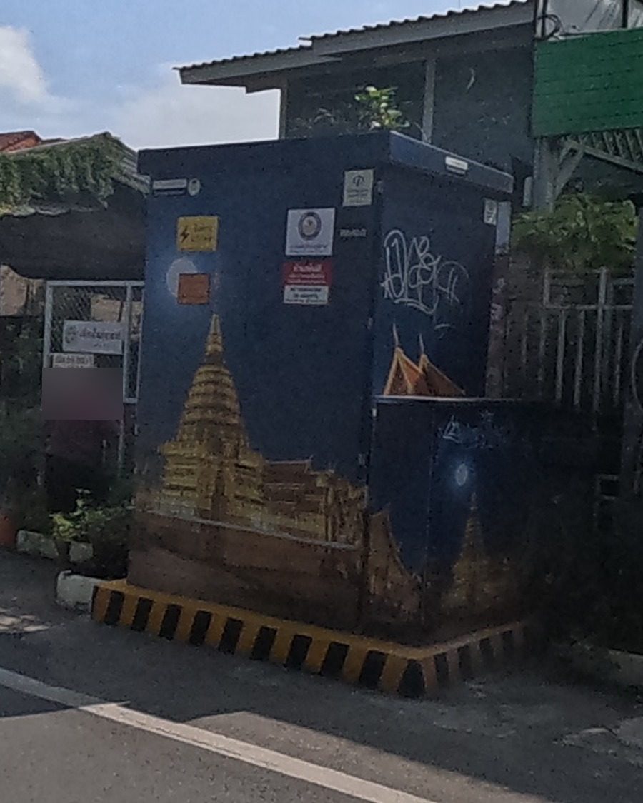 Hand-painted temple scene utility box