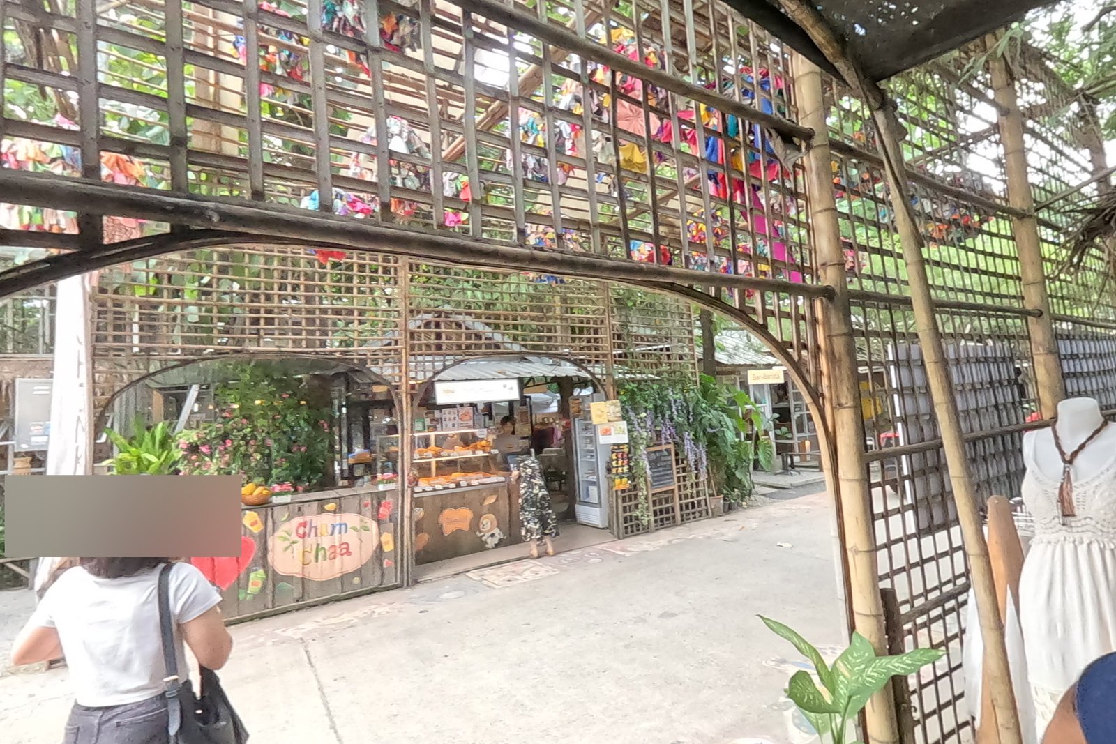 Through the lattice arch to the bakery — Chamcha Market, San Kamphaeng