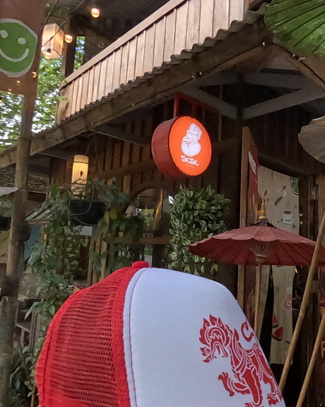 Toh Toh's lantern sign and wooden burger hut — Chamcha Market, San Kamphaeng