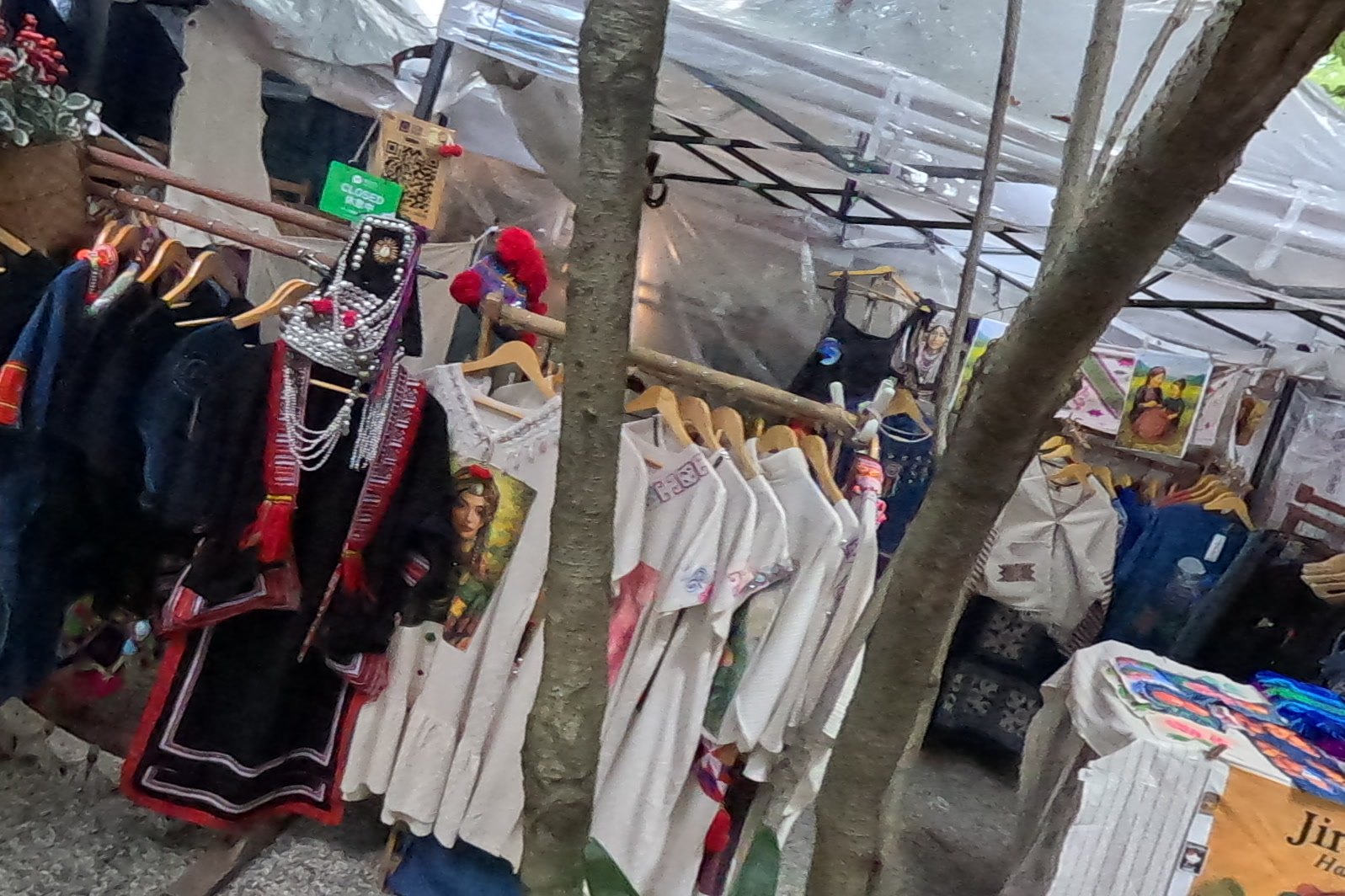 Jira: portrait prints and an Akha jacket — Chamcha Market, San Kamphaeng