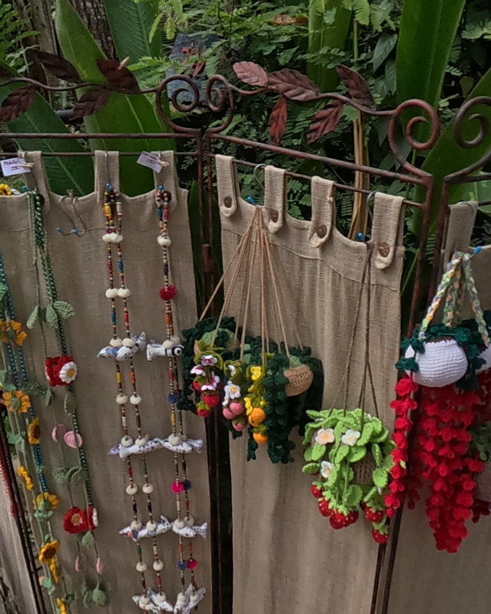 Crocheted hanging planters and bead strands — Chamcha Market, San Kamphaeng