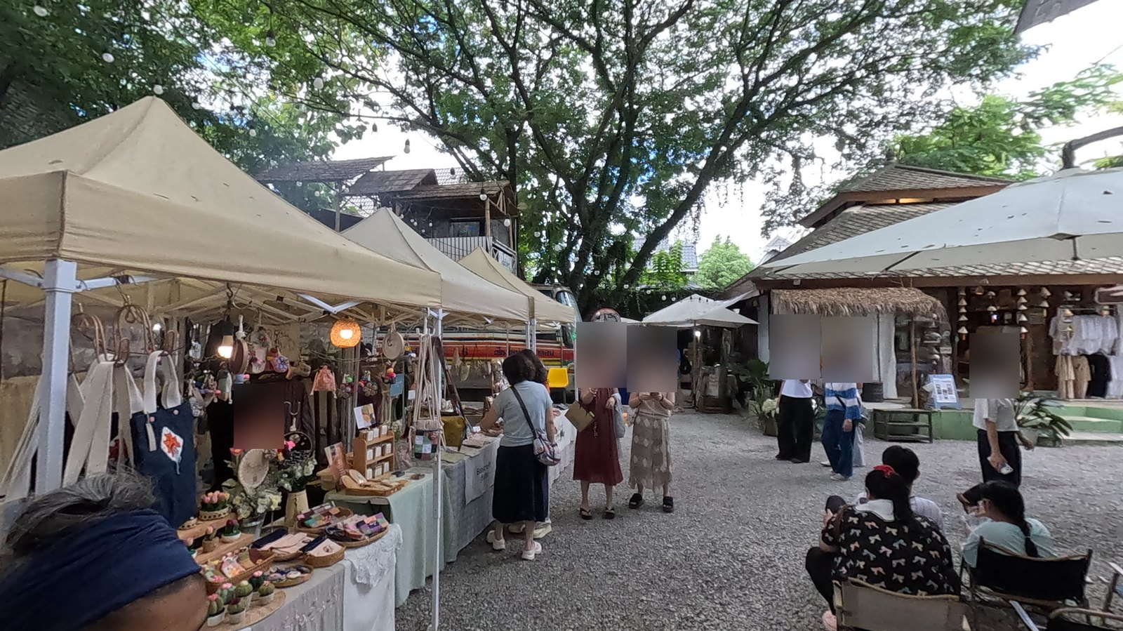 Craft tents under giant rain trees — Chamcha Market, San Kamphaeng