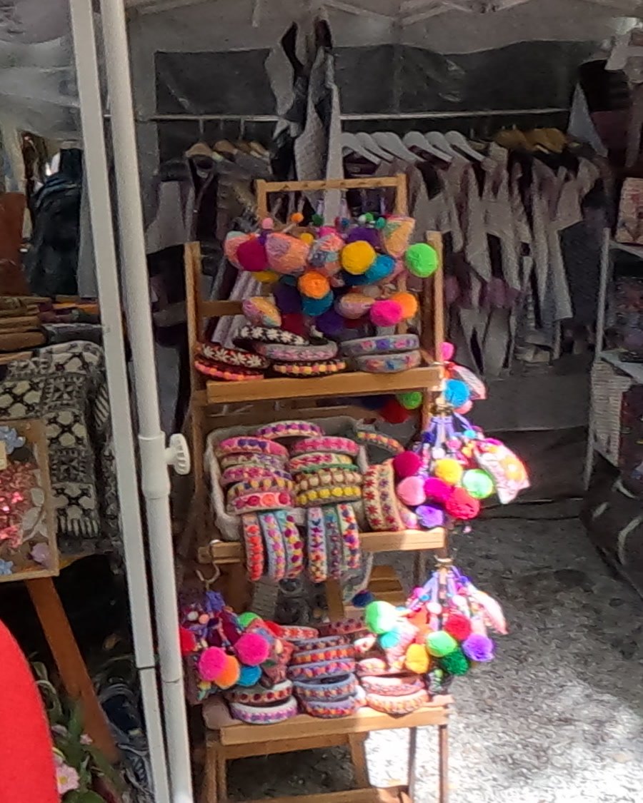 Embroidered bag straps and pom-poms — Chamcha Market, San Kamphaeng