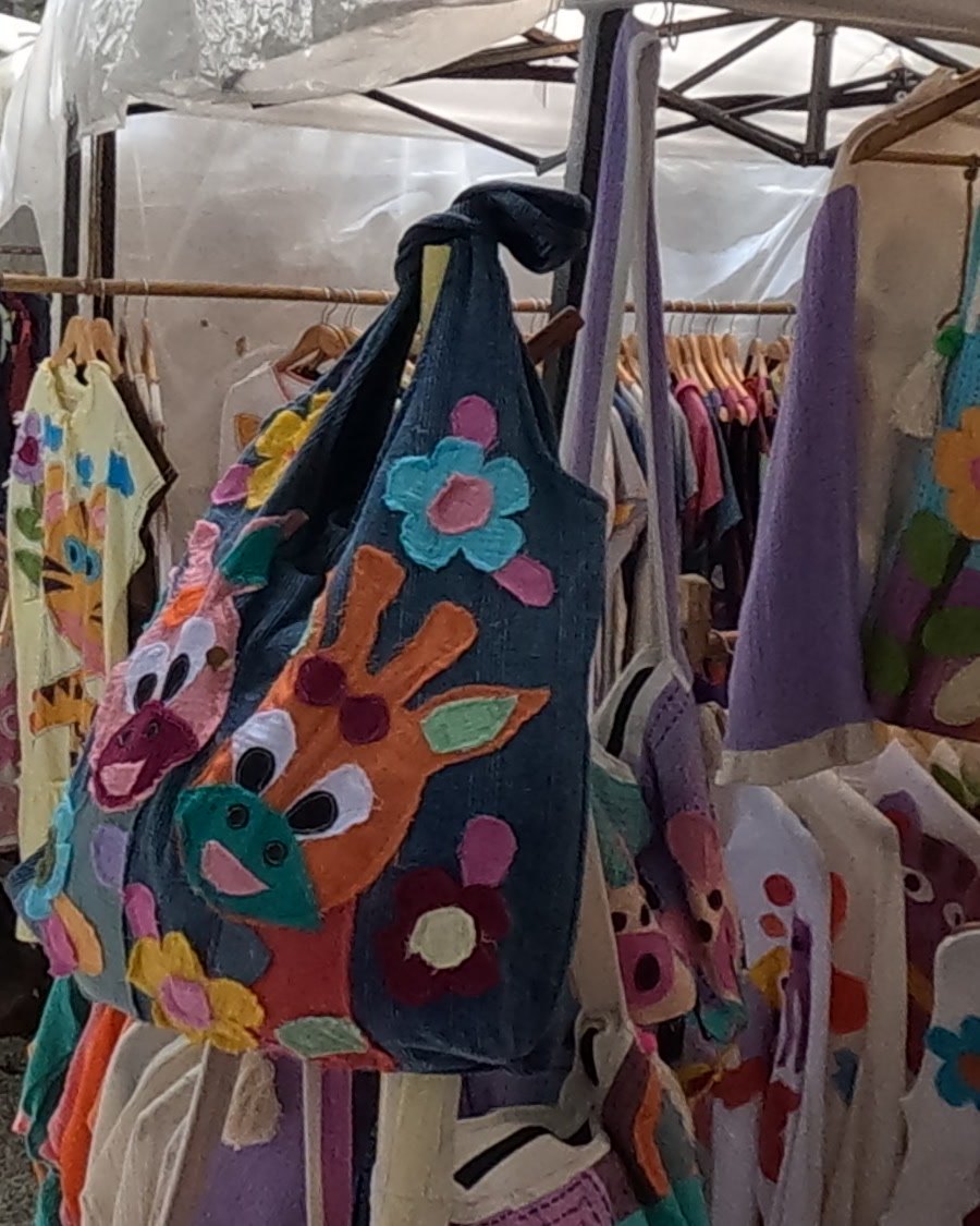 A denim tote with appliqué giraffes — Chamcha Market, San Kamphaeng