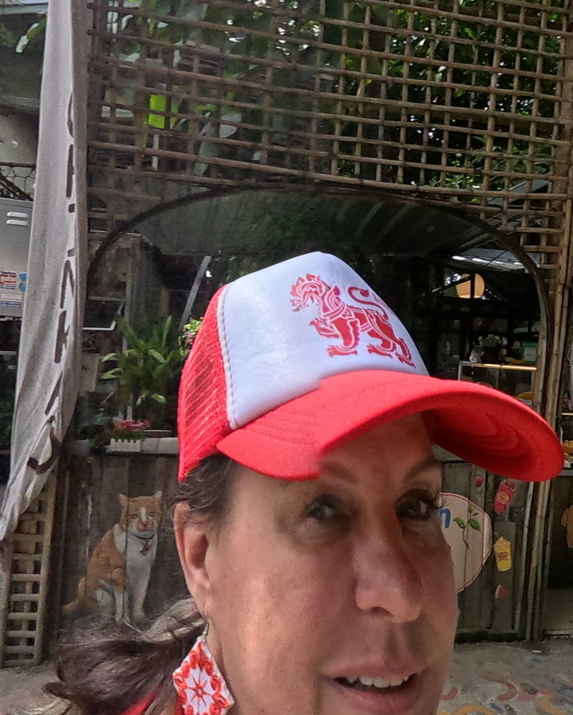 NaN in her singha cap at Pungpond — Chamcha Market, San Kamphaeng