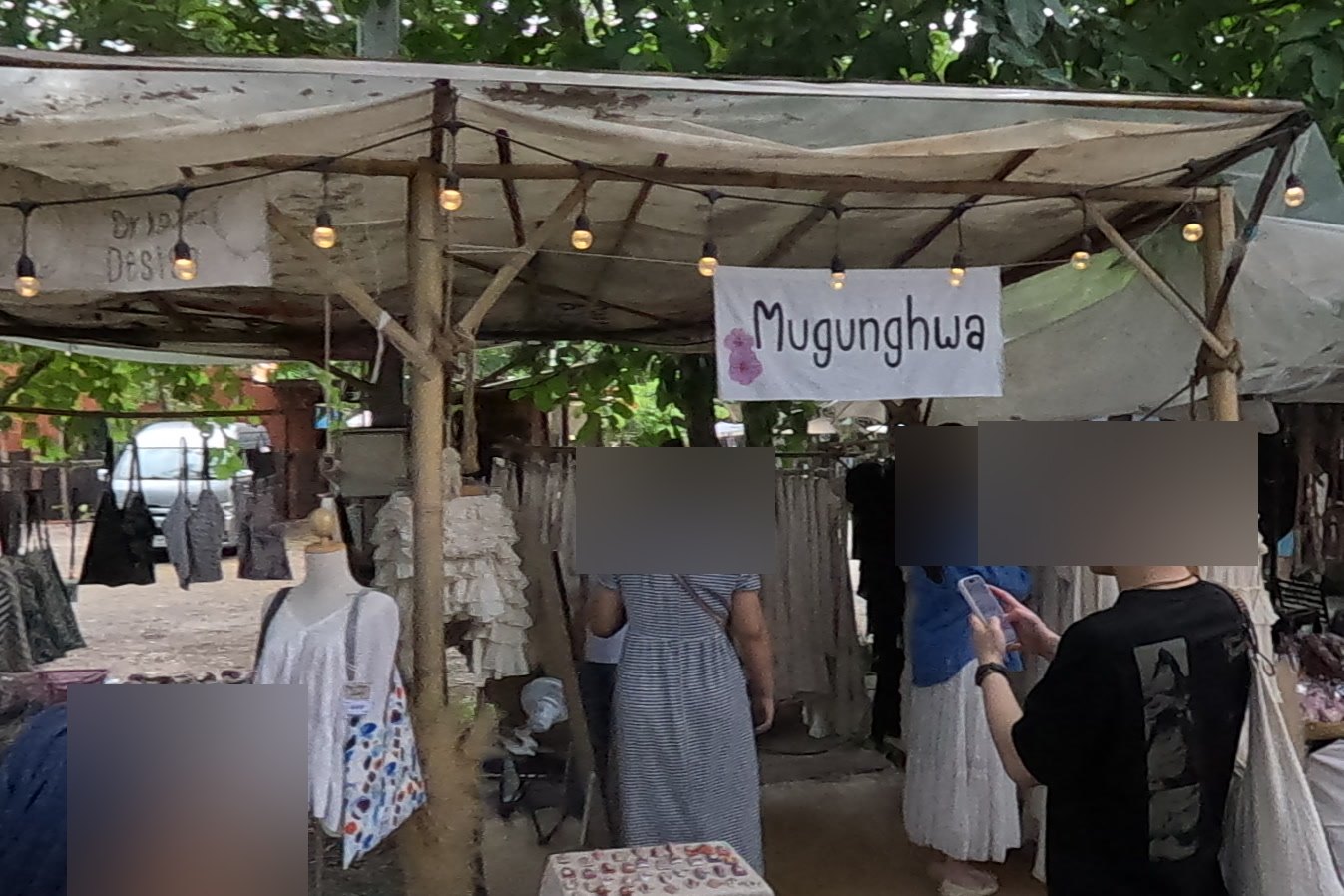 Mugunghwa at Chamcha Market, San Kamphaeng: white cotton dresses and blouses