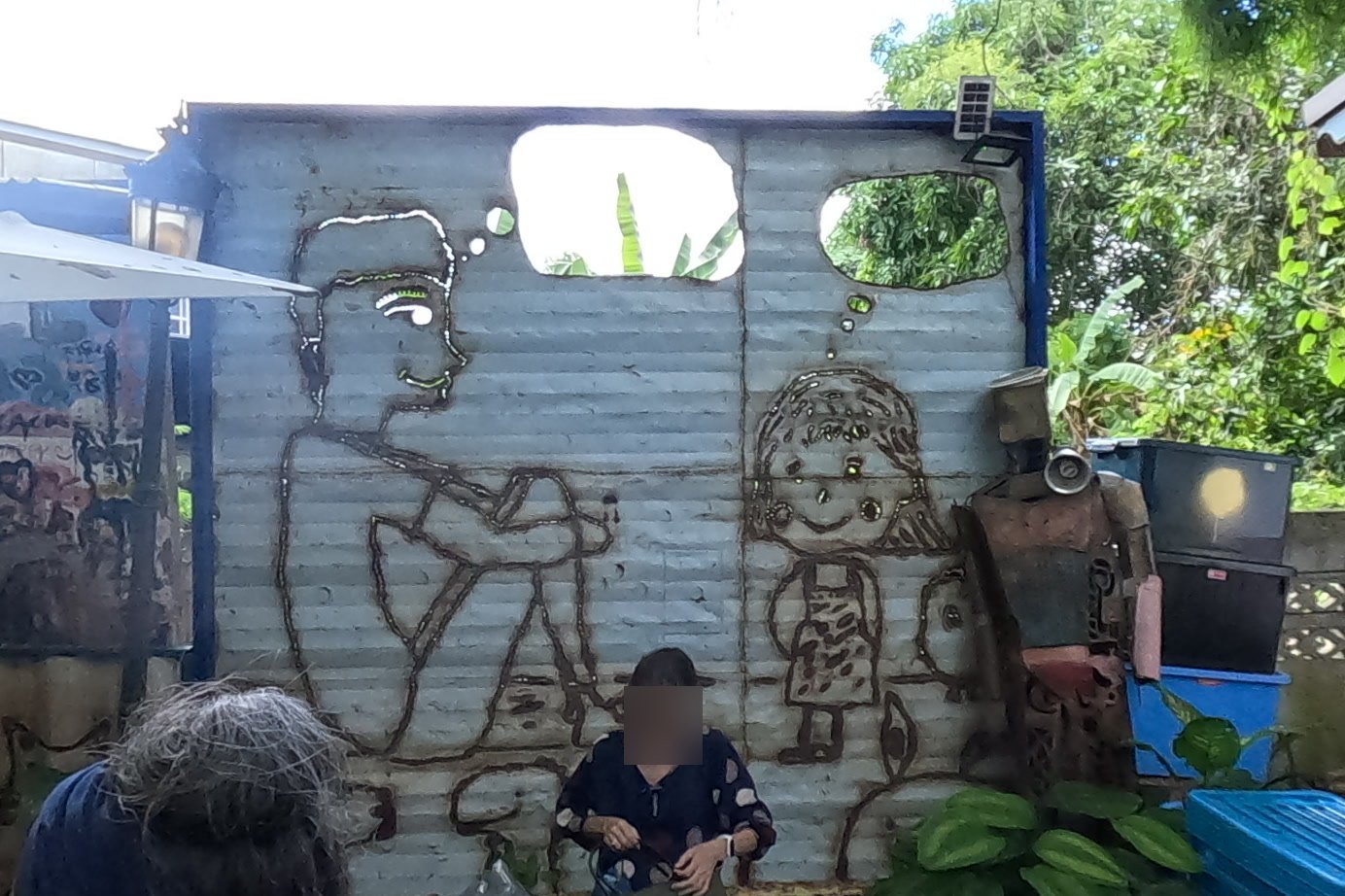 A corrugated wall drawn in rope — Chamcha Market, San Kamphaeng