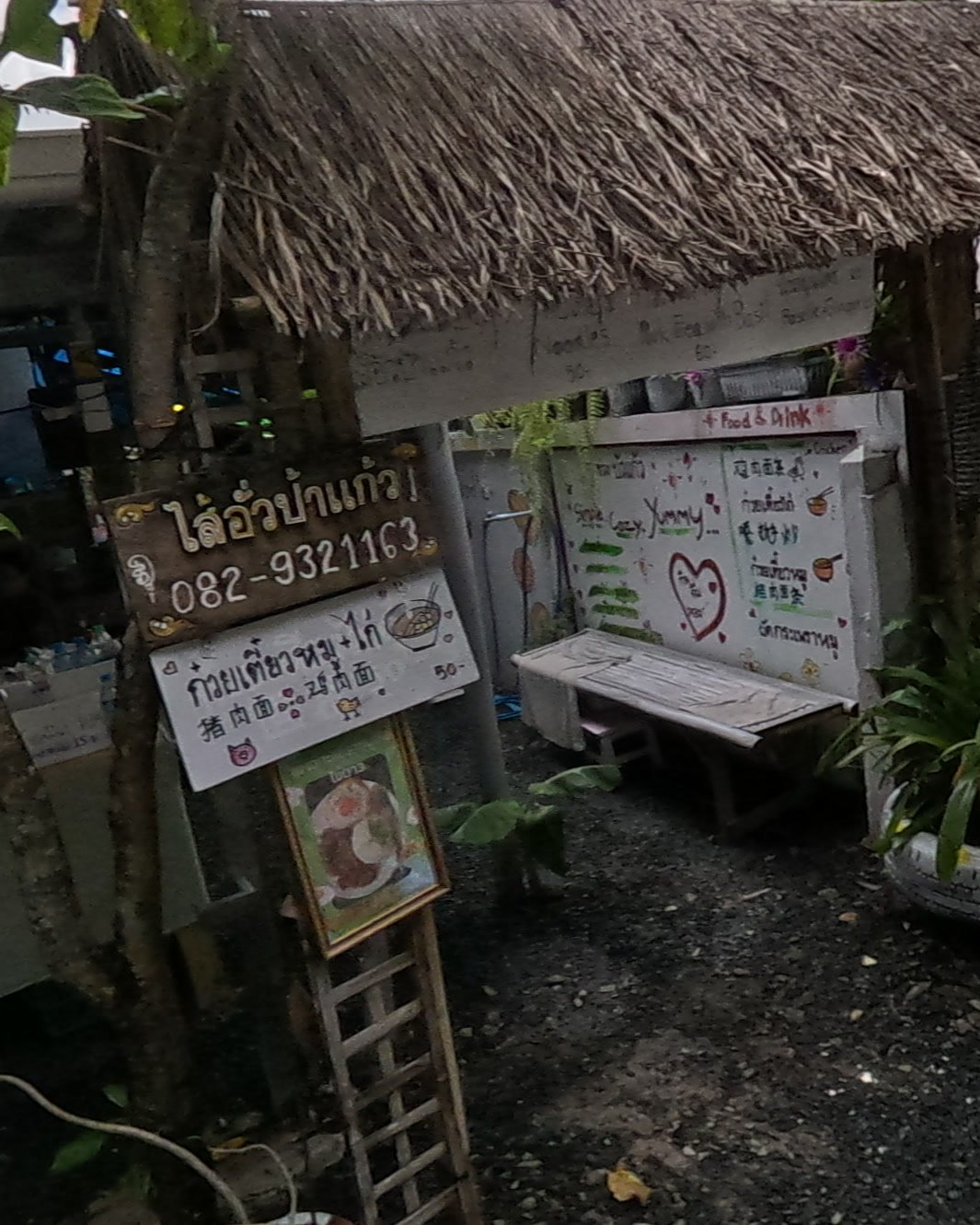 ไส้อั่วป้าแก้ว! sign and noodle board — Chamcha Market, San Kamphaeng