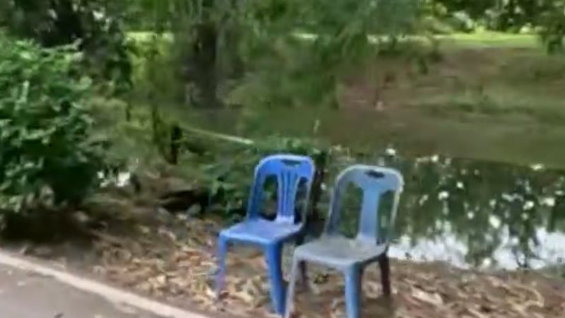 Two chairs by the canal — San Kamphaeng
