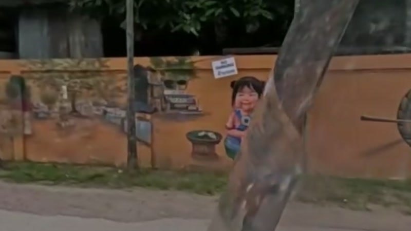 Folk-art mural on temple wall — San Kamphaeng