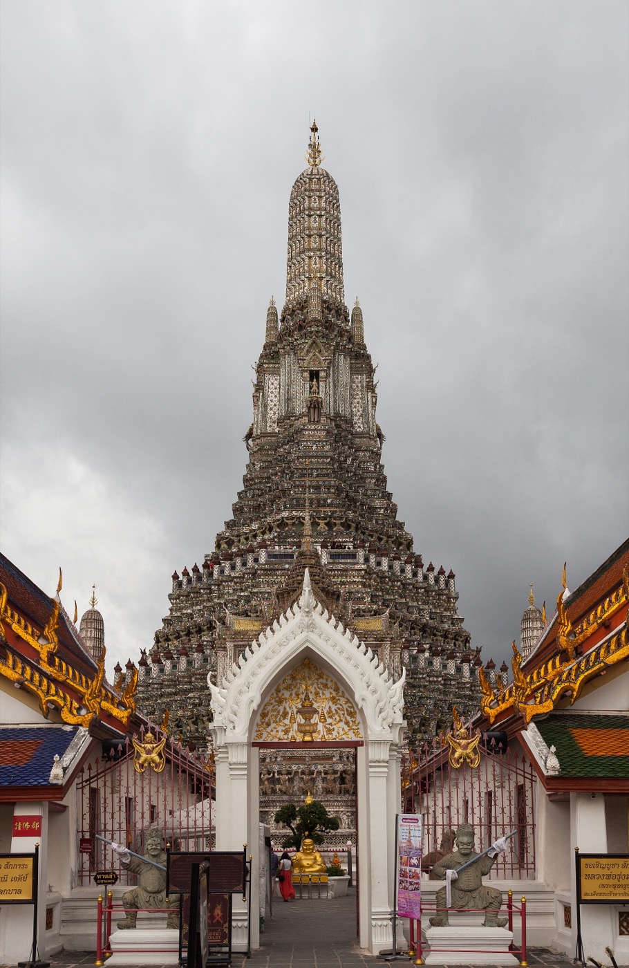 The central prang of Wat Arun, Bangkok: smaller towers echo the tall one, tier on tier.