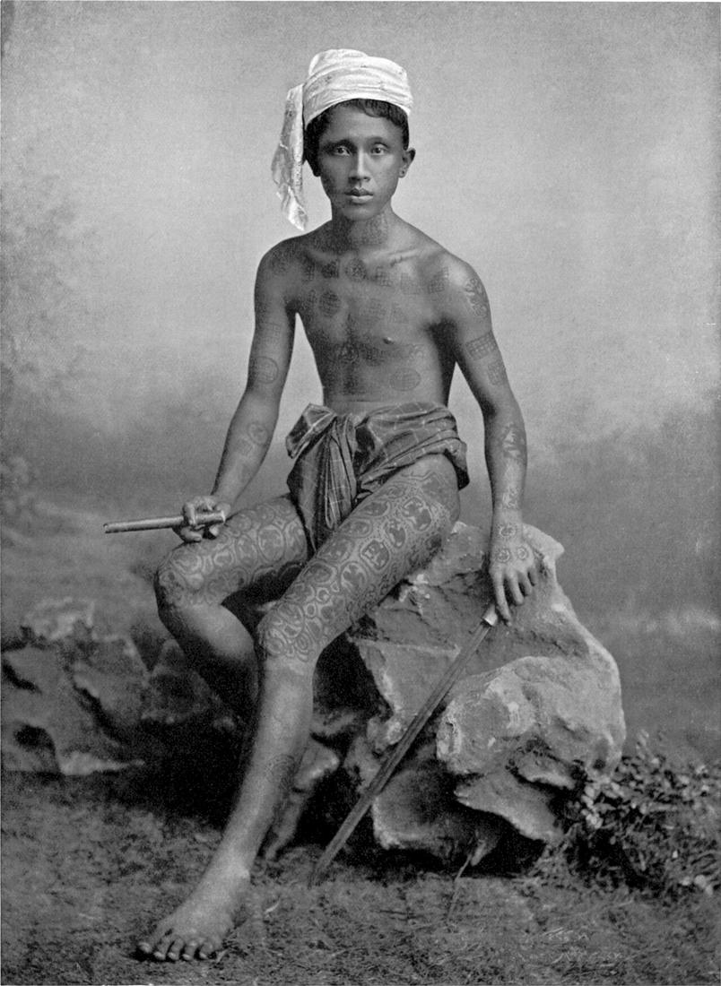 Burmese tattooingEvery Burman who has any self-respect is tattooed in blue from the waist, about the top of the cloth to the knee. The figures of tigers, ogres and so forth are encircled with scroll l