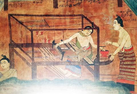 Mural painting of Thai women working and smoking at Wat Phumin, a Buddhist temple in Nan province, Thailand.
