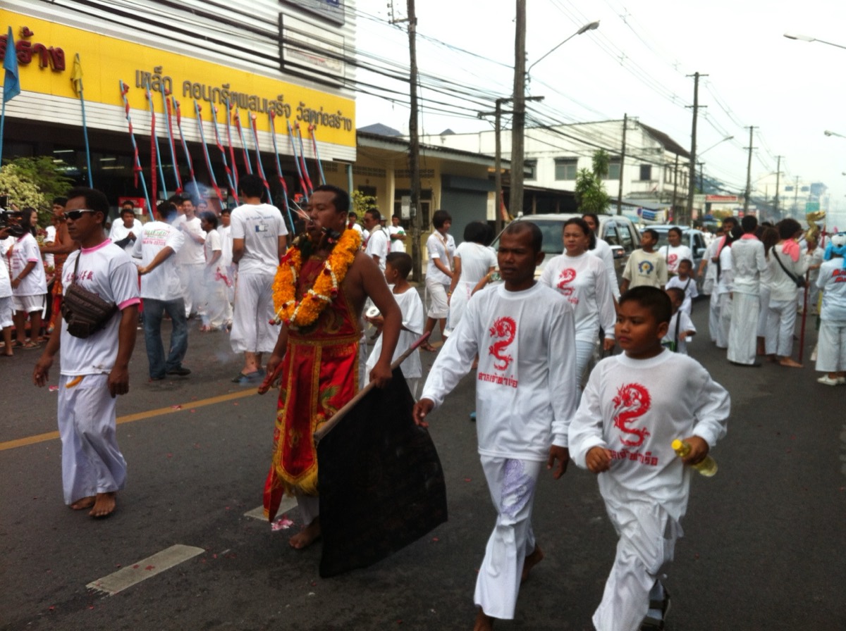 Morning procession into Phuket Town