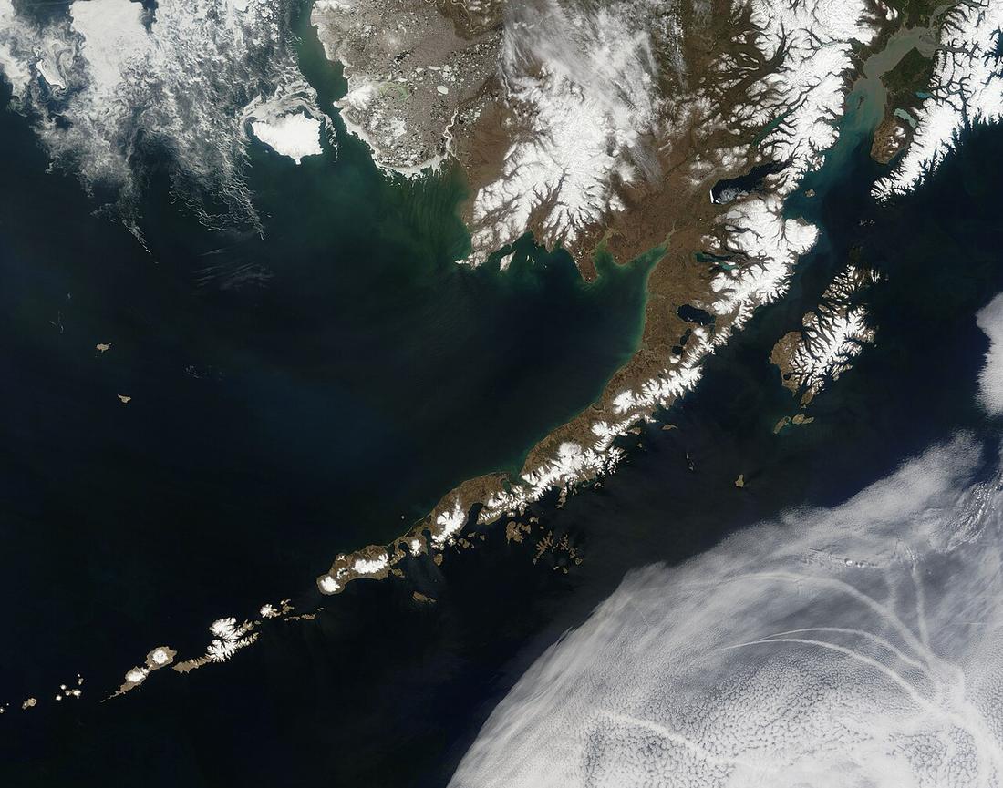 Satellite picture of the Aleutian Islands and the Alaska Peninsula, located in the south of the state of Alaska, United States.