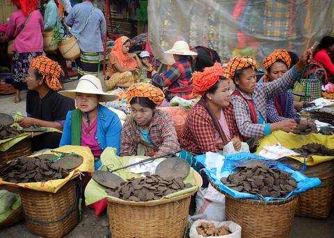 Ethnic women selling fermented soybeans on market day (12 January 2020)