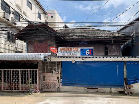 Srintip Guesthouse and Number One Vegetarian and Thai FoodThis gingerbread building is notable for its carved wooden gable depicting the Constitution phan, the symbol of Thailand's constitutional mona