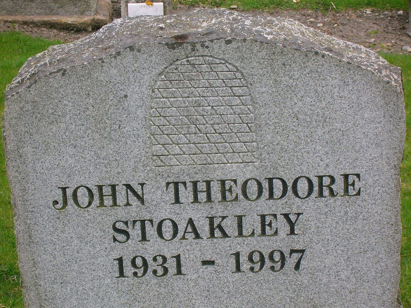 A straw beehive carved on a gravestone at Stobo Kirk